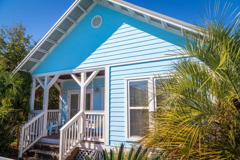 The Perfect 30A Beach Cottage. Porch swing is the perfect spot for coffee and catching up on your favorite book.