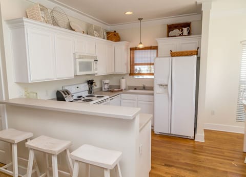 Large kitchens with every cooking dish and utensil you'll need for a week at the beach!