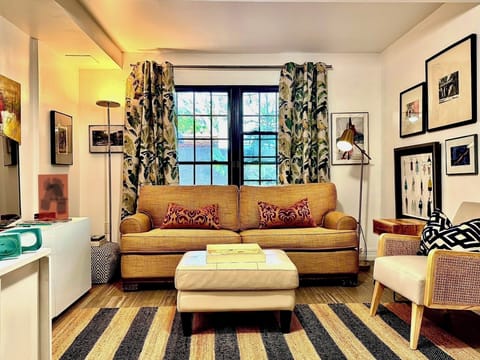The apartment is filled with original art and very comfortable furniture.