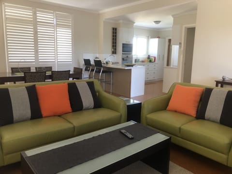 Relax in our comfortable sitting room while staying at Allora.