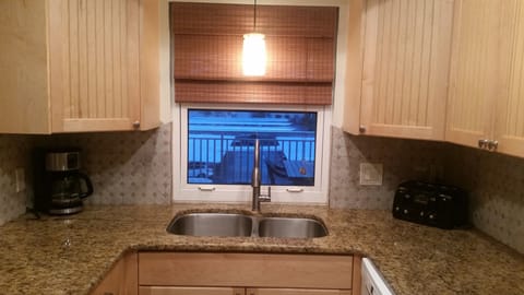kitchen window overlooking balcony