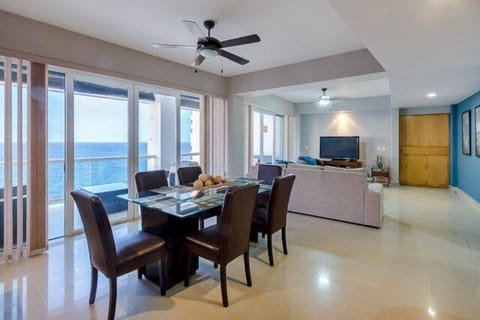 Floor to ceiling-windows stretch the length of the common areas
