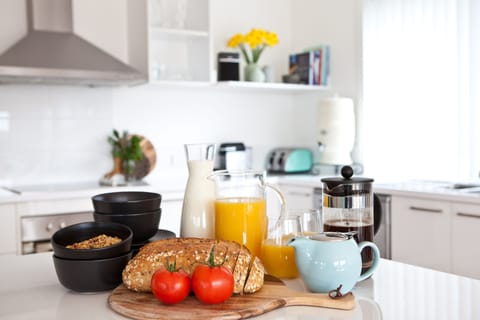 Breakfast provisions include cereal, fresh bread, fruit, juice, tea and coffee