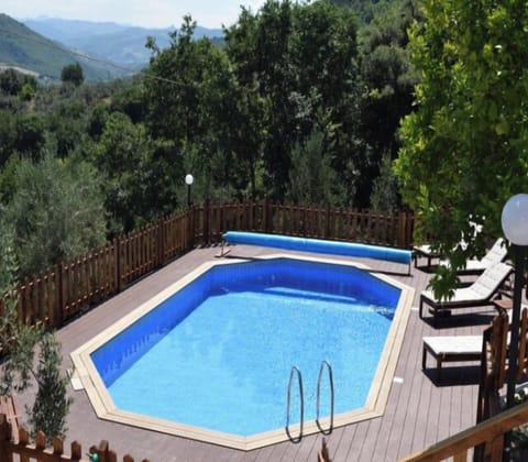 Beautiful private pool with amazing views from the deck .