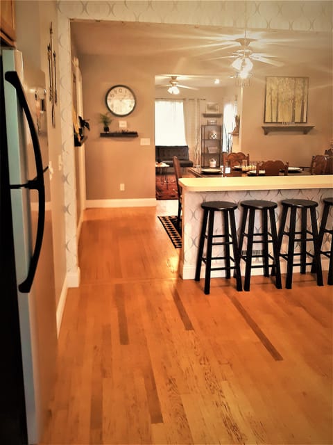 Breakfast bar between kitchen and dining room.