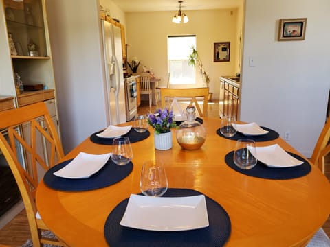 Diningroom table seats 6, 2 more at breakfast bar, 4 more at kitchen table