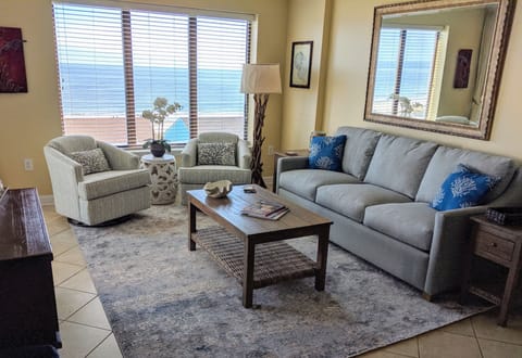 Living room is spacious and comfortable, with a spectacular view of the ocean!