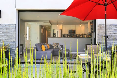 When the patio doors are open, the kitchen, living room, and patio area become one memorable meeting place for everyone!