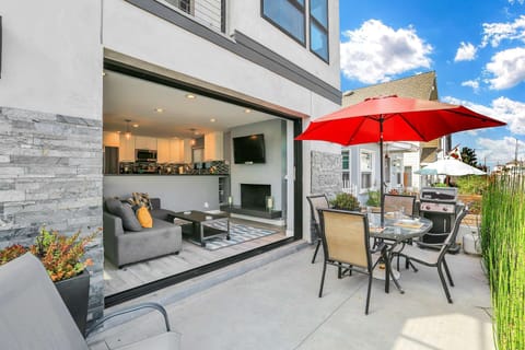 The best part about this home is how the living room opens up to the patio!