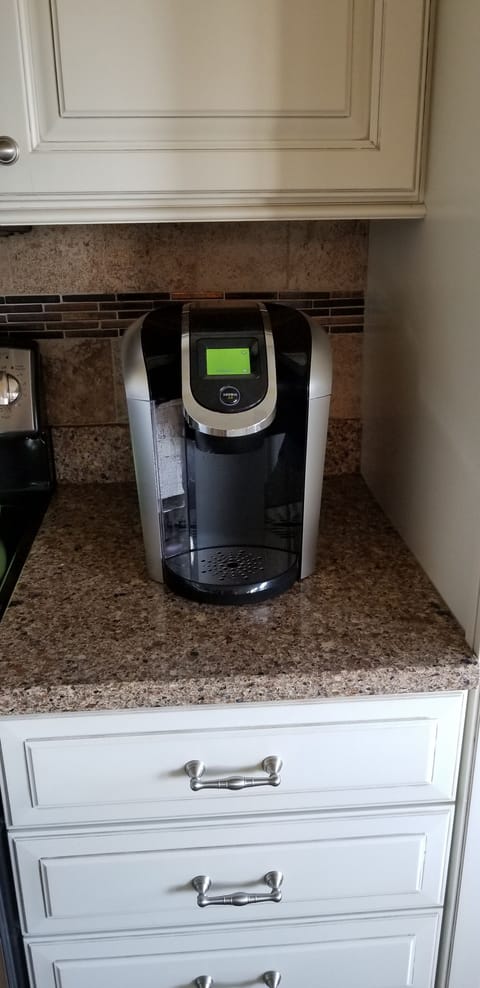 Both a regular coffee maker and a Keurig maker for your enjoyment.