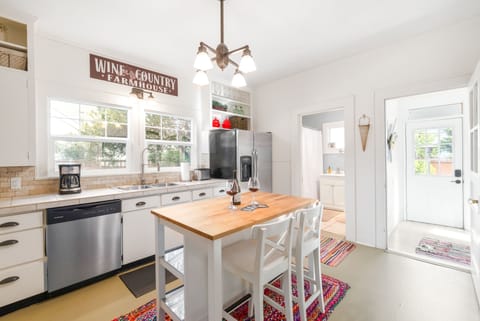 Farmhouse Kitchen | Doorway to Laundry Room | Out to Covered Patio