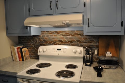 Our kitchen is well stocked with plenty of dishes, appliances and other more.