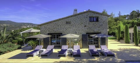 Side view of villa. Both sets of doors lead to the main living room