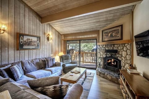 Huge sectional sofa in front a warm fire- welcome!