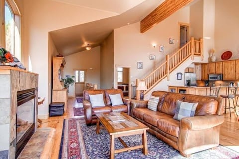 Living room on main level with gas fireplace.