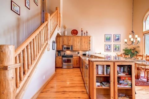 Full kitchen on main level with stainless GE profile appliances.