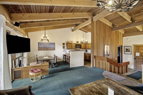 Living area open to dining and kitchen