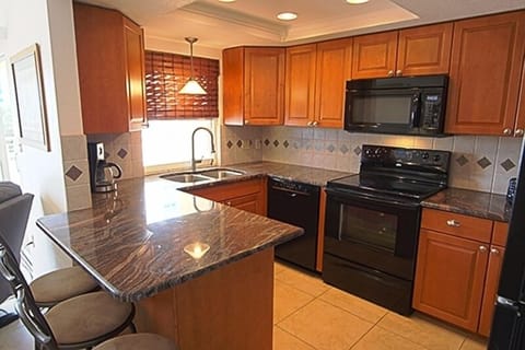 Fully remodeled & furnished kitchen with granite countertops & large pantry area