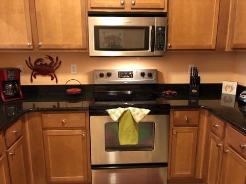 Fully equipped kitchen with stainless steel appliances