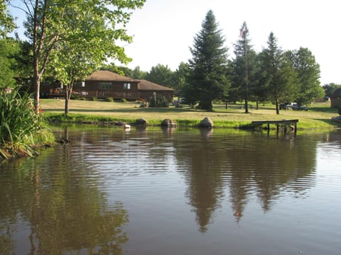 View of log home from pond