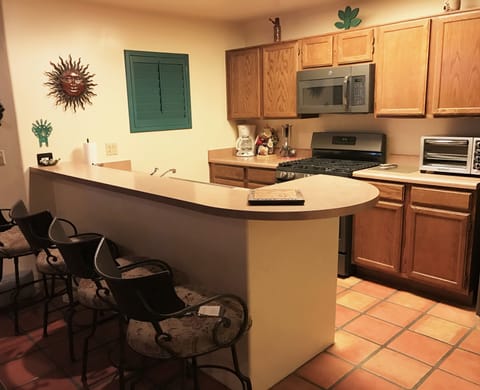 New Slate Stove, Microwave and Refrigerator in Stocked Kitchen.