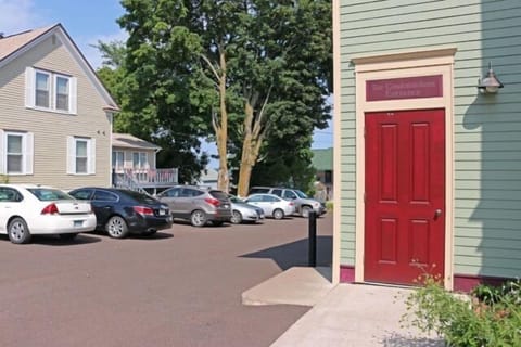 Private parking for 2 vehicles, just steps from entrance door to up stairs. .