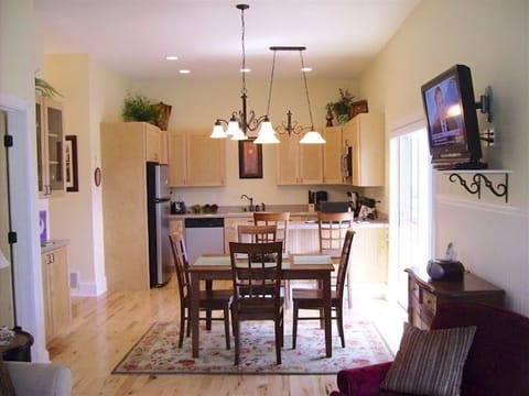 Kitchen & dining area. Sliding door goes out the Lake View Patio. Table & chairs