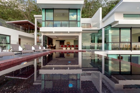 The beautiful infinity pool with master bedroom above.