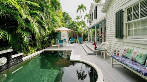 Welcome to CASA SERENDIPITY, a cozy island home designed in Key West's famous 'conch cottage' style...