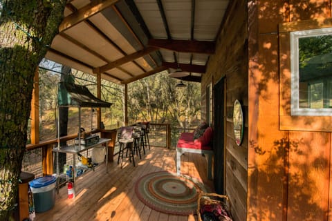 Cook house and Bathroom
Covered deck with Bar