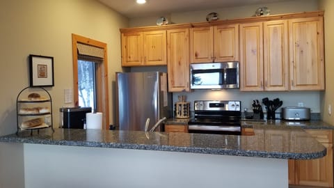 Nicely equipped kitchen with  a fabulous view