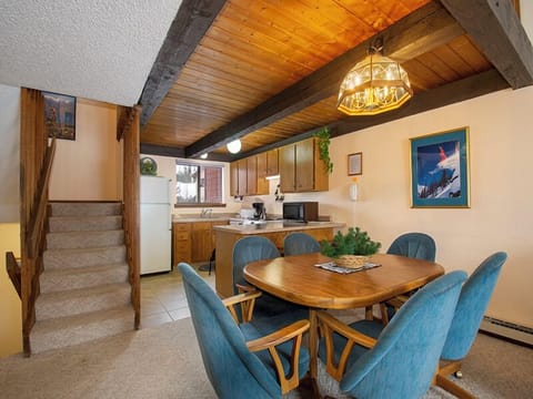 Gather around your private dining table beneath warm wooden beams, where home-cooked meals and mountain memories are made together.