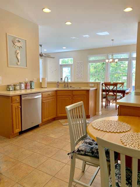 Well stocked kitchen with additional seating for little ones.