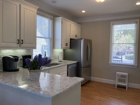 Kitchen renovated with new counters, back splash and appliances.