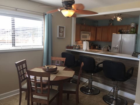 Dining area with expandable table and bar seating too