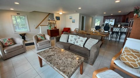 Perfect Lakefront Getaway, Maine - Living room with large panoramic windows.