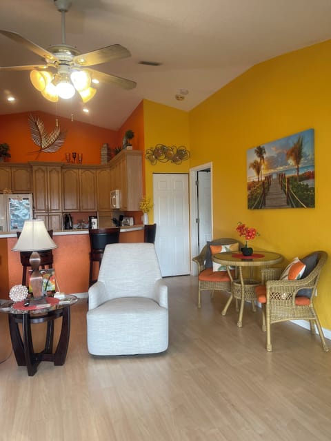 On the right of kitchen, is a door to a upright washer & dryer, beside MBedroom.