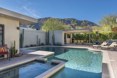 Your Private Backyard Oasis – Relax and recharge in this spacious, secluded backyard with gorgeous mountain views and a large pool as its central feature.
