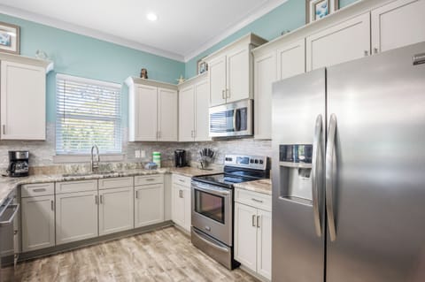 Beautiful kitchen with plenty of counter space.