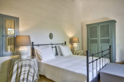 The king-sized bed in the master bedroom 