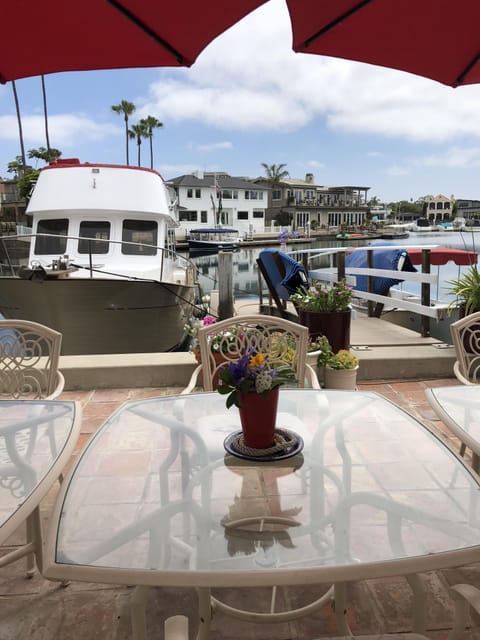 SWIM OR PADDLEBOARDOR TAKE A BOAT RIDE OFF THE BEAUTIFUL PATIO