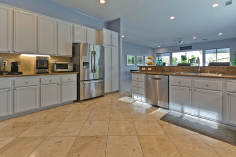 Plenty of kitchen amenities including Keurig, Nespresso and *fluffy ice* machine