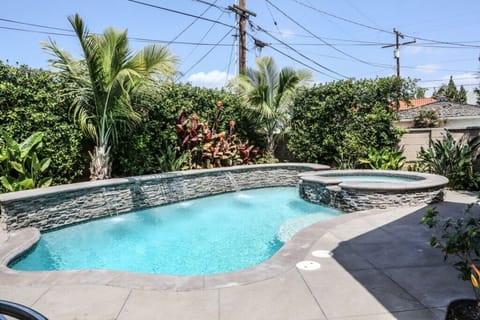 Beautiful Pool with Jacuzzi and Waterfall Feature