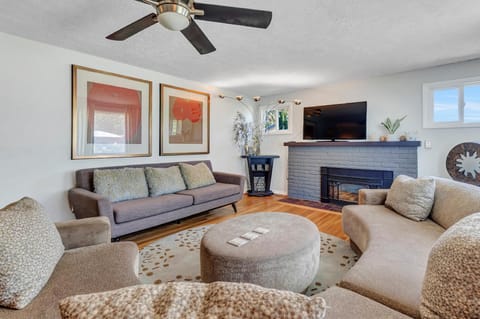 Unwind in the utmost comfort in our inviting living room, featuring ample seating options for everyone to gather and relax.  Find your perfect spot and make lasting memories.