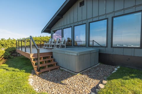 Enjoy the ocean front hot tub and deck from this amazing house!