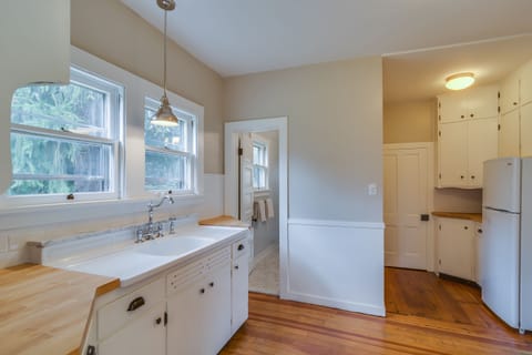 farmhouse sink and butcher block countertops