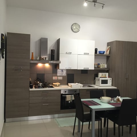 Kitchen & Dining Room including washing machine and all necessities