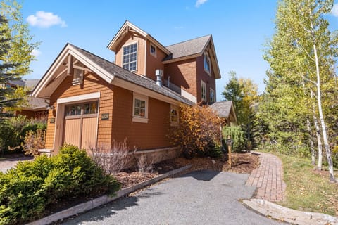 Exterior view of the home during summer.