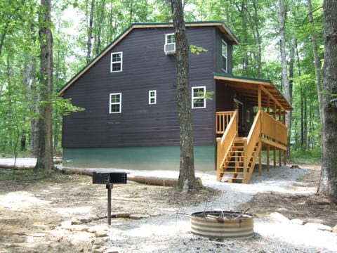 Side view of cabin - back porch and fire pit area