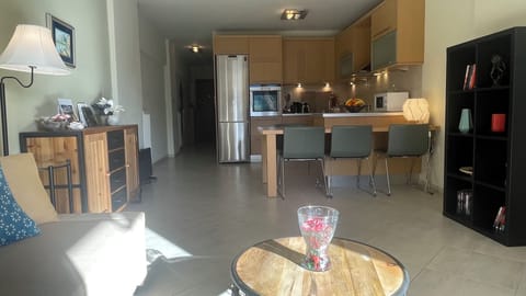 Large and modern, warm and cozy living room - open kitchen space view 